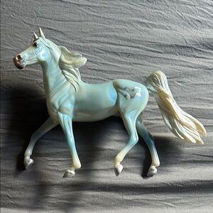 Blue and white iridescent Breyer horse figure